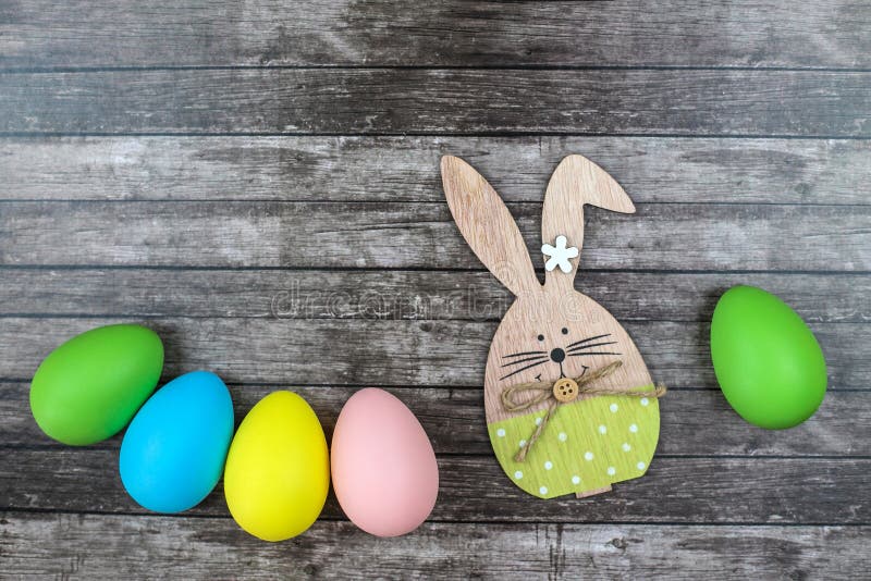 Easter Eggs and Bunny on Wooden Background. Stock Image - Image of ...