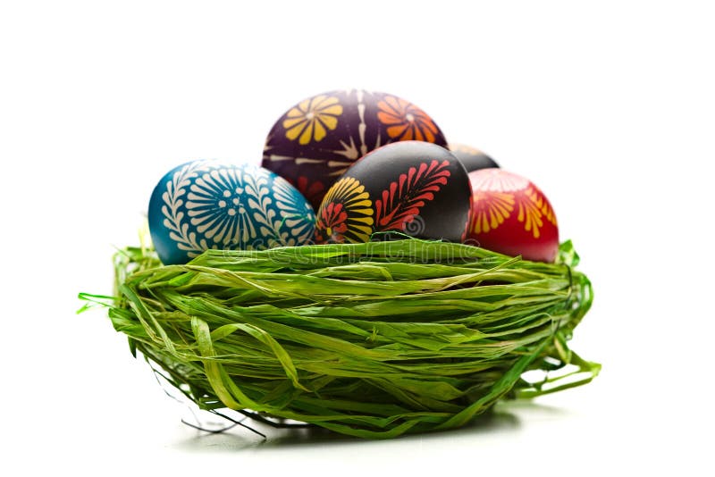 Easter Eggs in Nest on Green