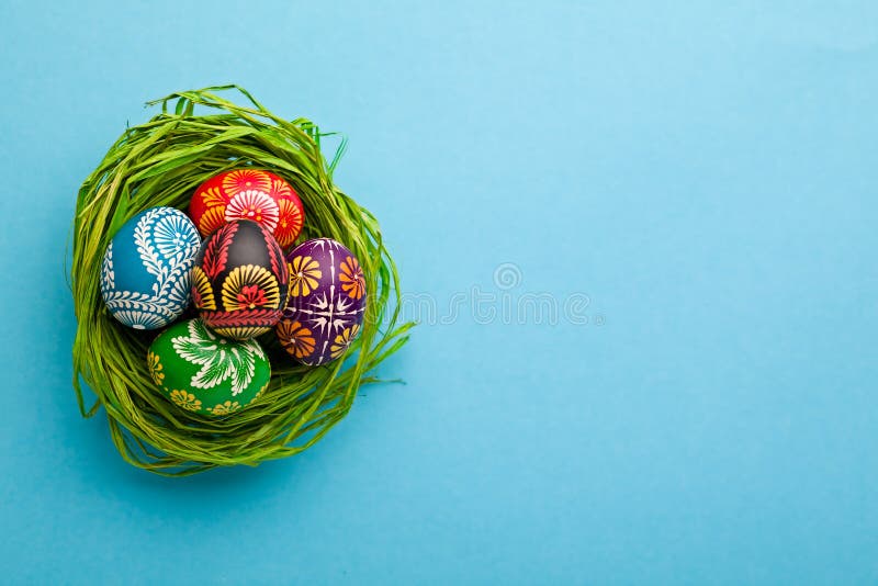 Easter Eggs in Nest on Green