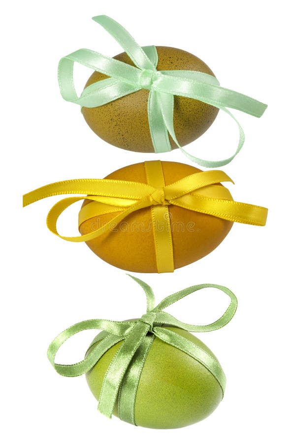 Easter eggs with ribbon on the white background