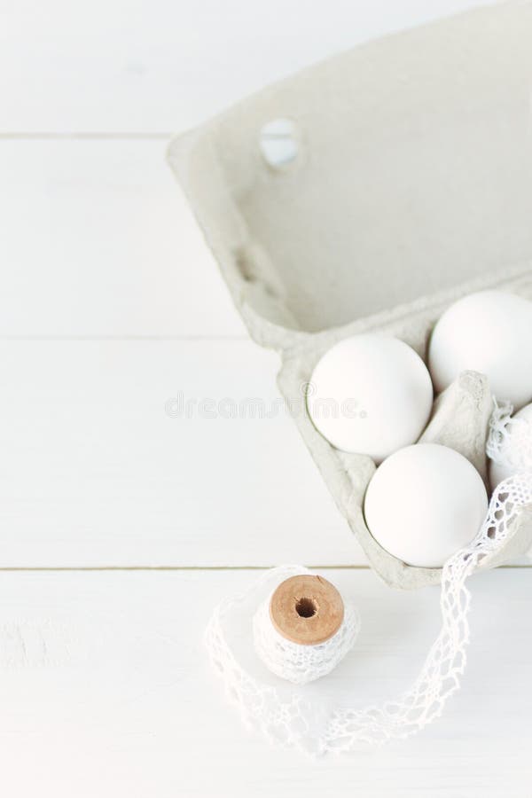 Easter eggs on white wooden background royalty free stock photo