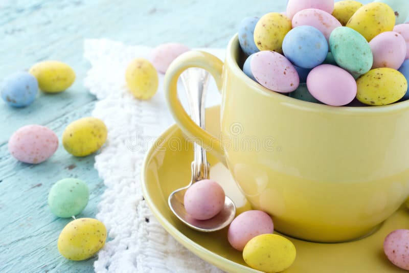 Easter eggs in a yellow cup