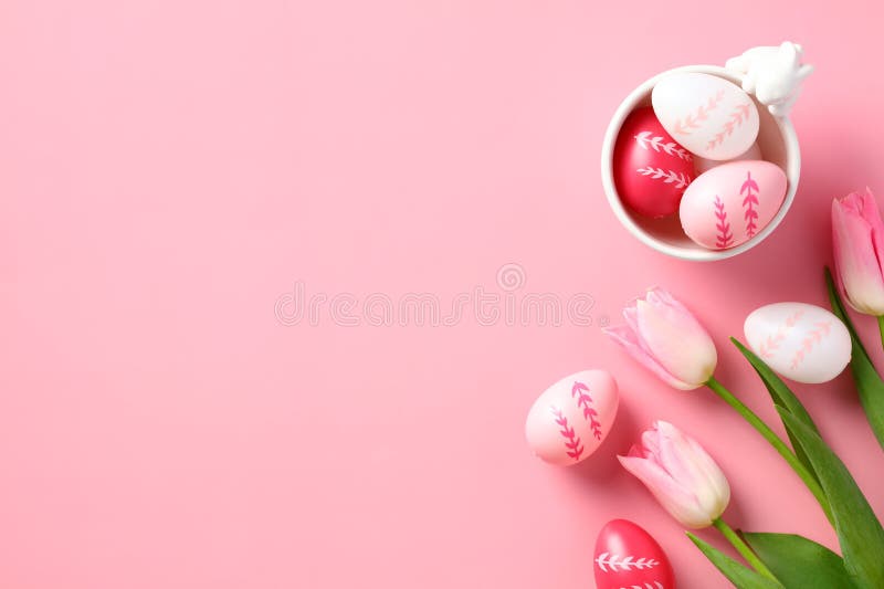 Easter Holiday Flat Lay Composition. Easter Eggs with Tulips on Pastel