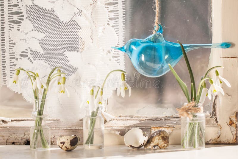 Easter interior with snowdrops and quail eggs
