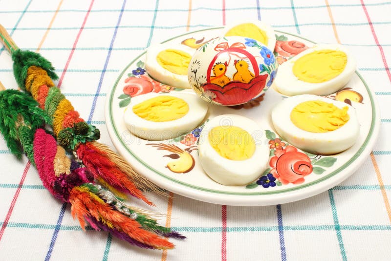 Easter Palm, Halves of Eggs and Painted Egg on Colorful Plate Stock