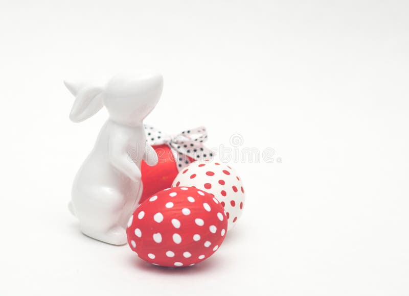 Easter porcelain bunny with eggs stock photo Easter porcelain bunny with eggs stock photo