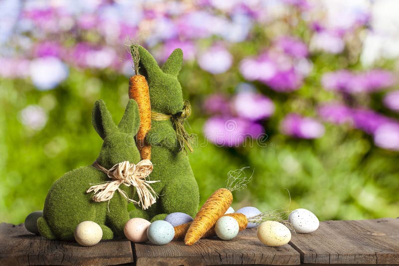 Easter Rabbits Eggs Carrots stock photo Easter Rabbits Eggs Carrots stock photo