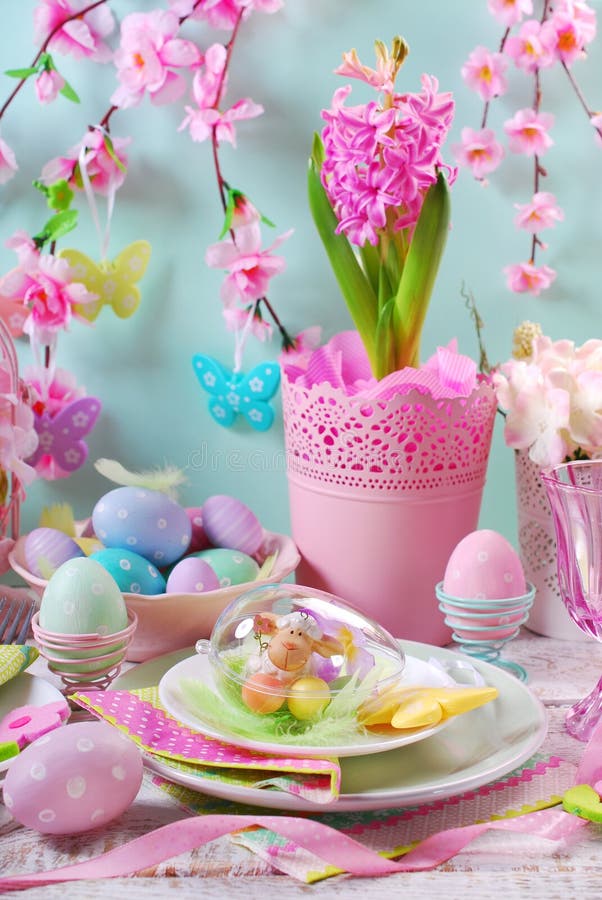 Easter Table Decoration with Eggs and Flowers in Pastel Colors Stock