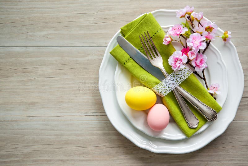 Easter table setting with spring flowers and cutlery royalty free stock photo Easter table setting with spring flowers and cutlery royalty free stock photo