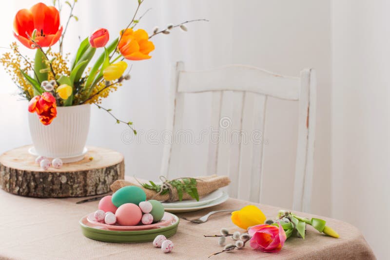 Easter table with tulips and decorations