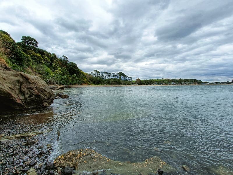 Eastern Beach, Auckland at Low Tide on a Cloudy Day Stock Photo Image