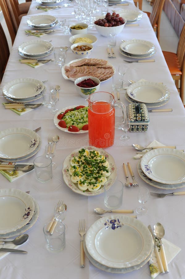 Eastern Breakfast Table Setting in Poland with Plates, Silverware and