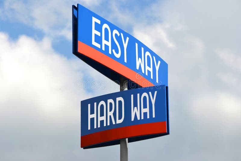 Easy and hard way - street sign, sky in background. Easy and hard way - blue and red street sign, sky in background royalty free stock photo Easy and hard way - street sign, sky in background. Easy and hard way - blue and red street sign, sky in background royalty free stock photo