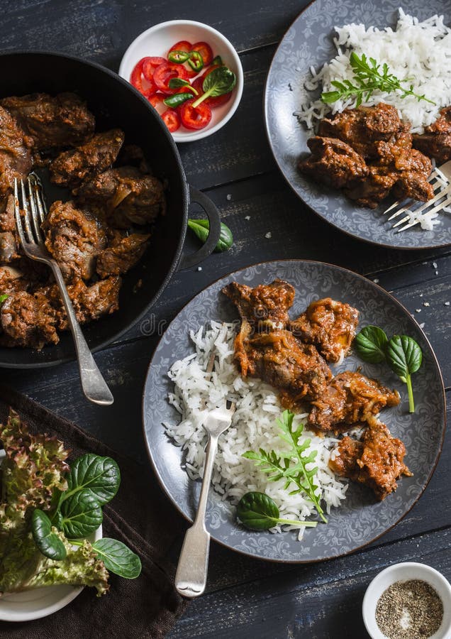 Easy Peri-peri Chicken Livers and Rice on a Dark Background, Top View ...