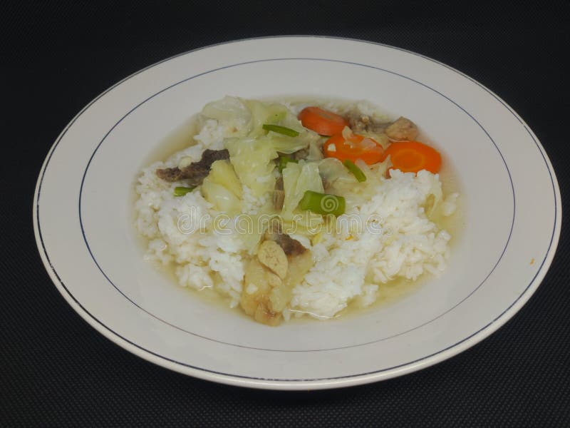 Easy Vegetable Soup with Rice in a White Dish Stock Image Image of