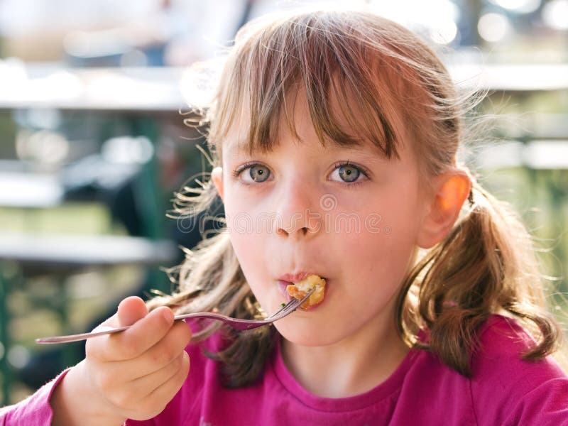Eating girl stock image. Image of child, food, satisfied 25662199