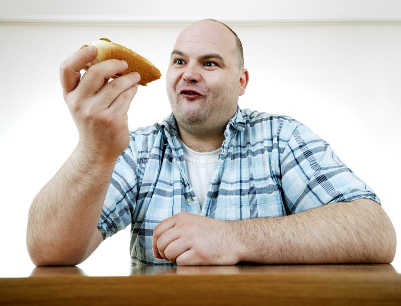 Eating a hot dog stock image. Image of roll, table, sausage - 2511449