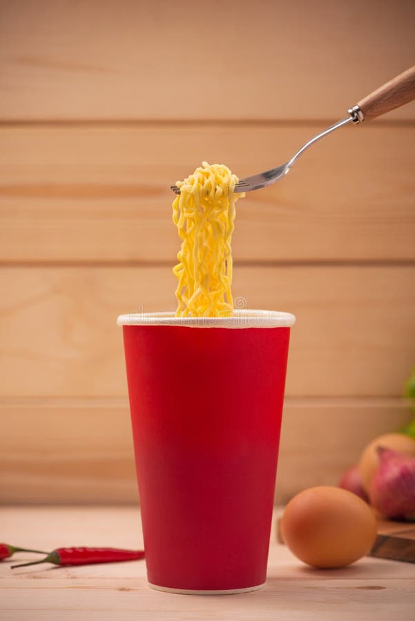Eating Instant Noodles in Cup with a Fork Stock Image Image of bowl
