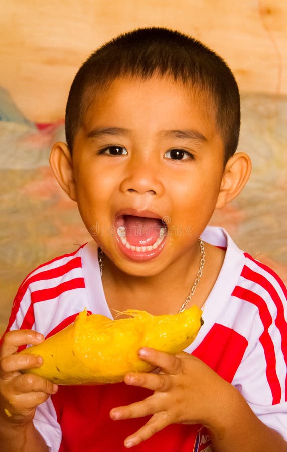 Eating mango stock image. Image of baby, background, face 40420495