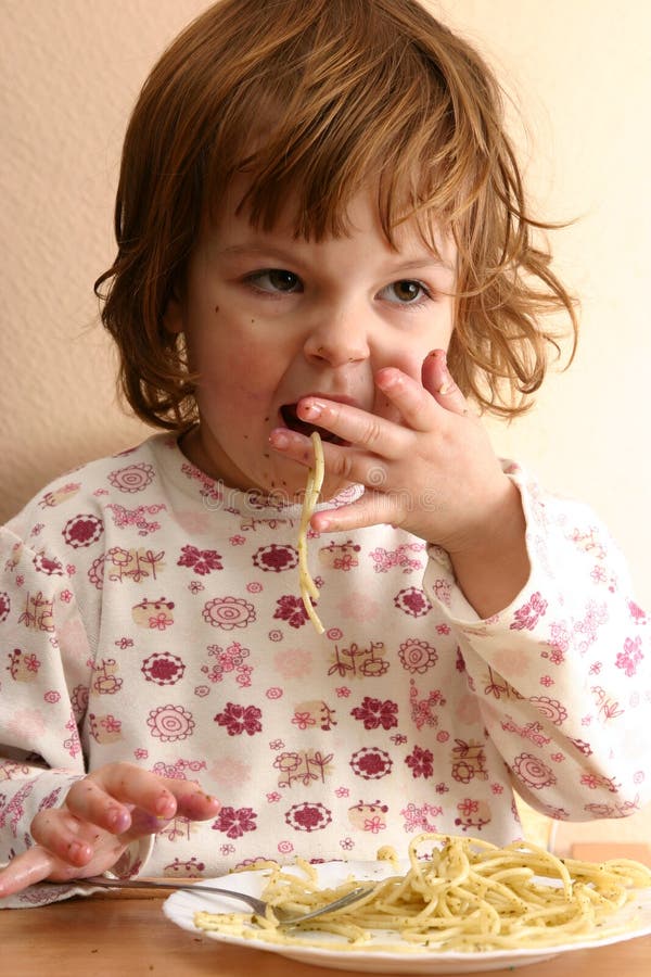 Eating pasta stock image. Image of dinner, girls, plate 1796557