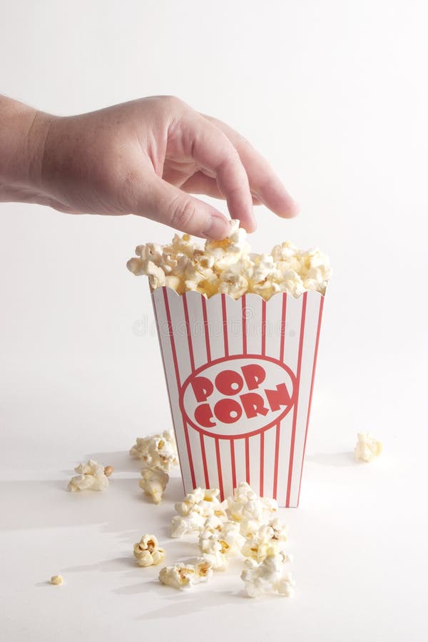 Eating popcorn stock image. Image of corns, white, full 34232889