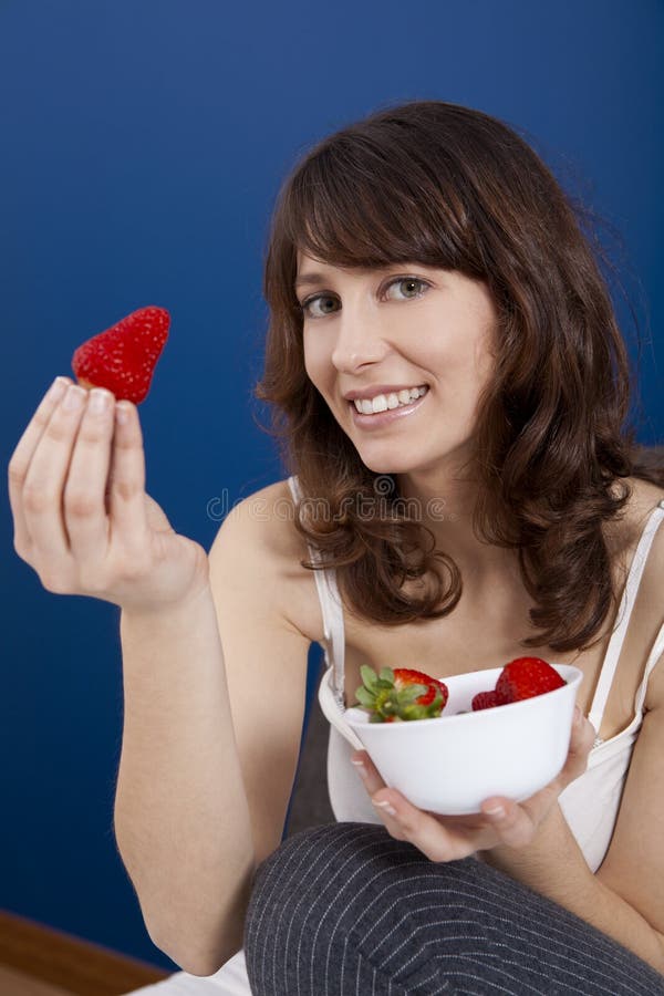 Eating strawberries stock image. Image of home, fresh 18878517