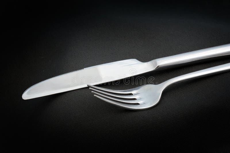 Eating Utensils/fork and Knife on Black Background Stock Photo Image