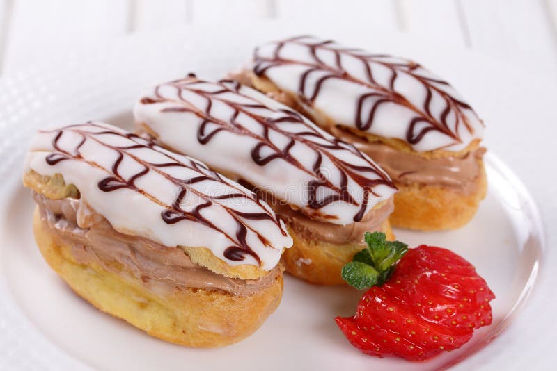 Eclairs with chocolate cream.