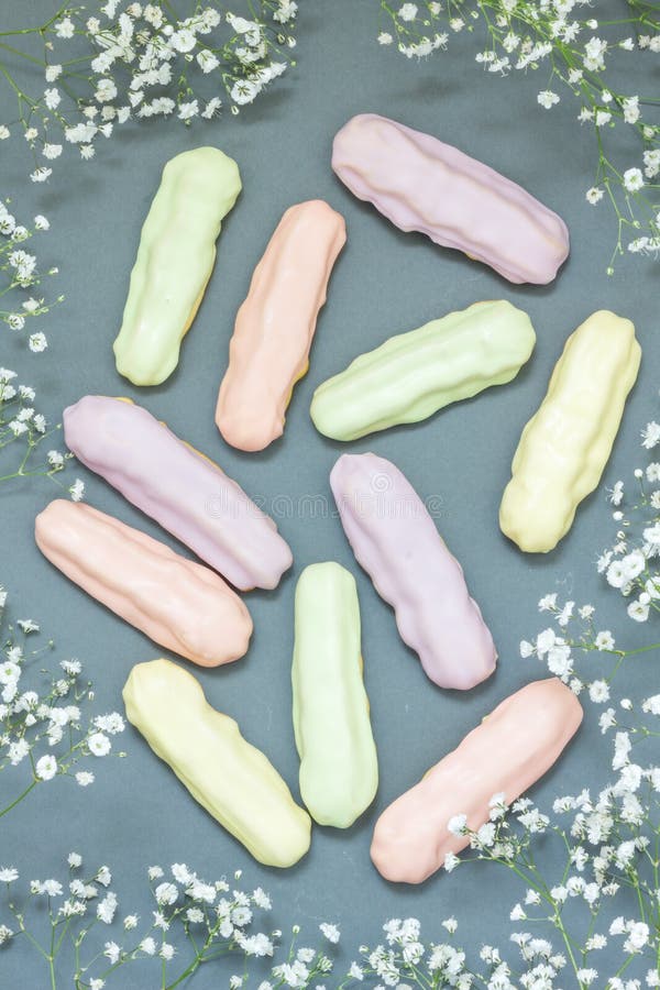 Eclairs with Pastel Color Icing Stock Photo Image of confectionery