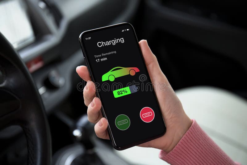 Eco electric car women hand holding phone with charging battery