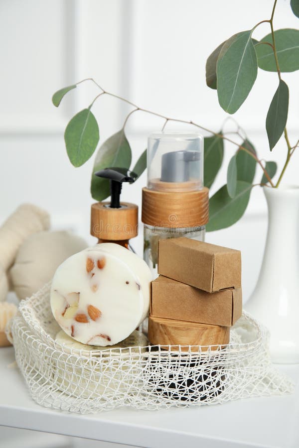 Eco Friendly Personal Care Products and Green Leaf on Beige Background, Flat Lay. Space for Text