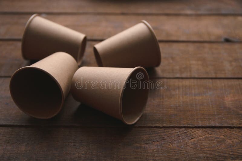 Ecological Kraft Paper Cups for Coffee and Tea Dark Brown Stock Image