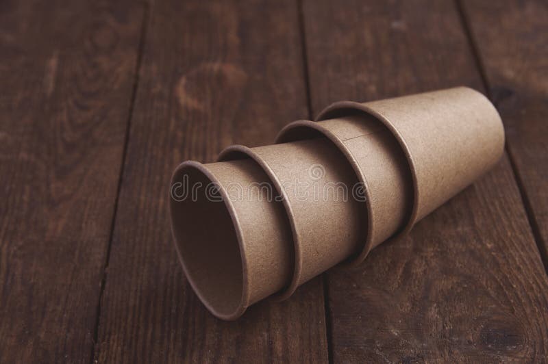 Ecological Kraft Paper Cups for Coffee and Tea Dark Brown Stock Image