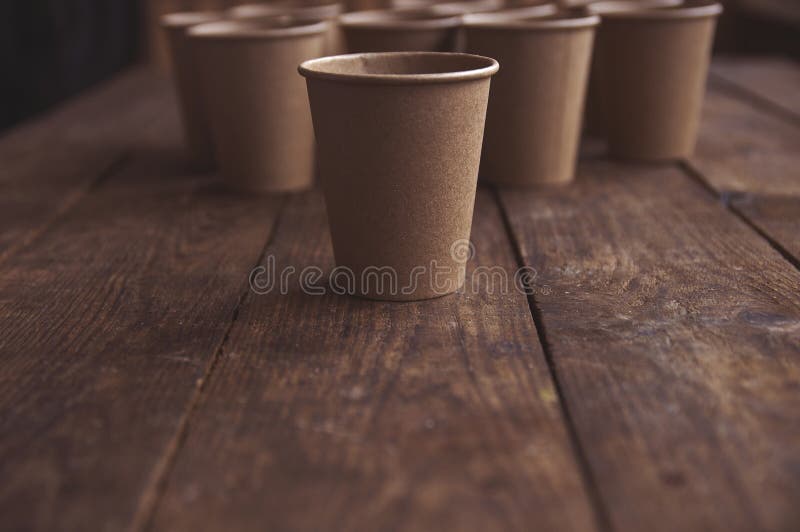 Ecological Kraft Paper Cups for Coffee and Tea Dark Brown Stock Image