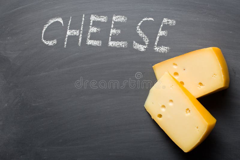 Edam cheese on blackboard stock photo. Image of freshness 54536436