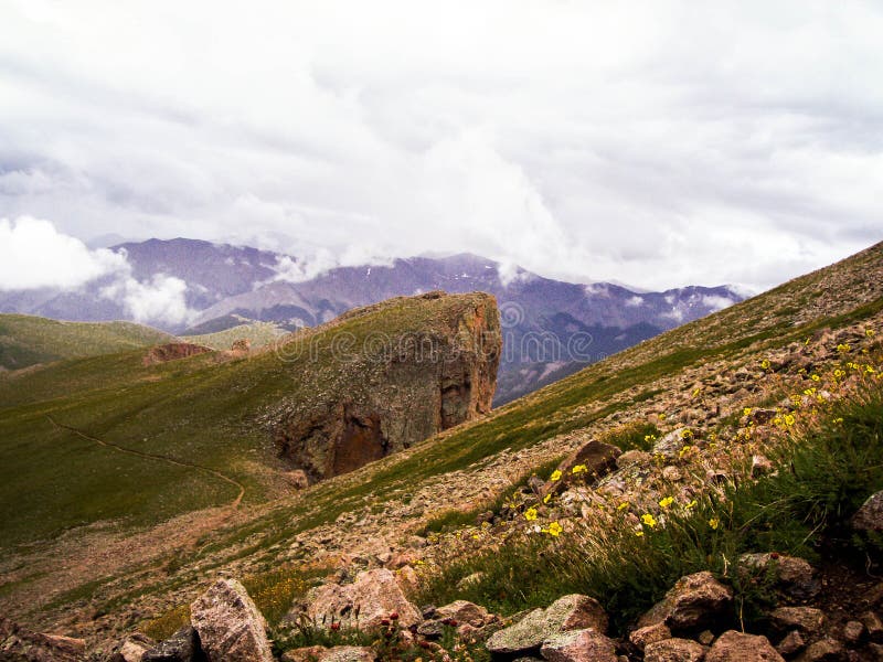 Edge of mountain stock photo. Image of mountain, rocky 77093332