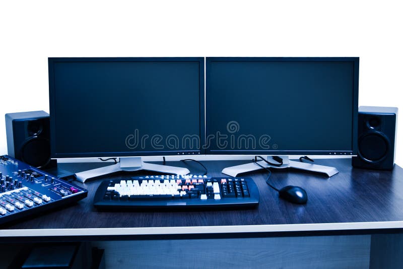 Dual monitor editing station with audio mixer. Computer editing stock images, royalty-free photos and pictures