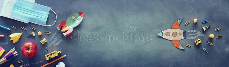 Education. Back to school concept. rocket cut from paper and painted over blackboard background. top view, flat lay royalty free stock photo Education. Back to school concept. rocket cut from paper and painted over blackboard background. top view, flat lay royalty free stock photo