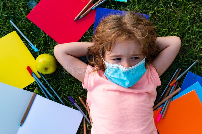 Education in the backyard. Sad schoolboy without classmates. Education in the backyard. Sad schoolboy without classmates royalty free stock image Education in the backyard. Sad schoolboy without classmates. Education in the backyard. Sad schoolboy without classmates royalty free stock image