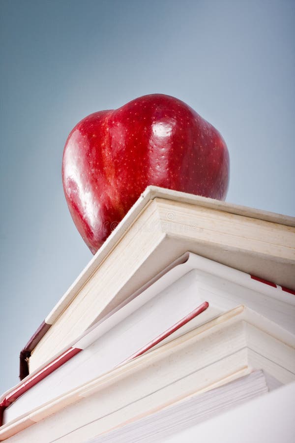 Education concept with apple and books