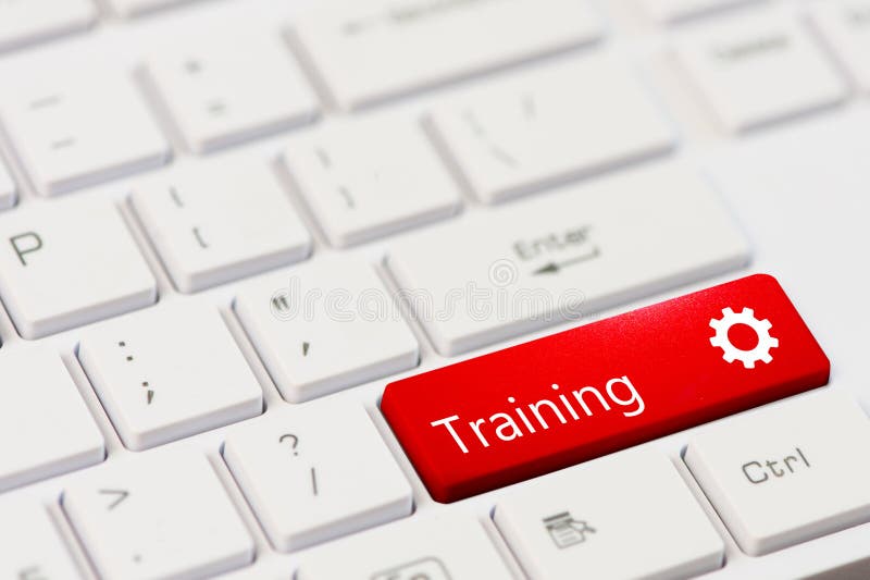 Concept educațional : tastatură computerizată cu instruirea cuvintelor pe butonul roșu stock image