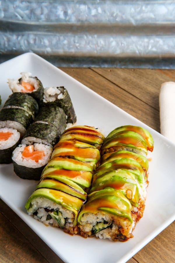 Eel Avacado Dragon Roll stock image. Image of sauce 220797223