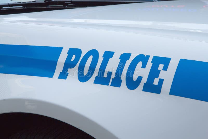 Een close-up van de politiewagen met een tekenPOLITIE. royalty-vrije stock afbeeldingen Een close-up van de politiewagen met een tekenPOLITIE. royalty-vrije stock afbeeldingen