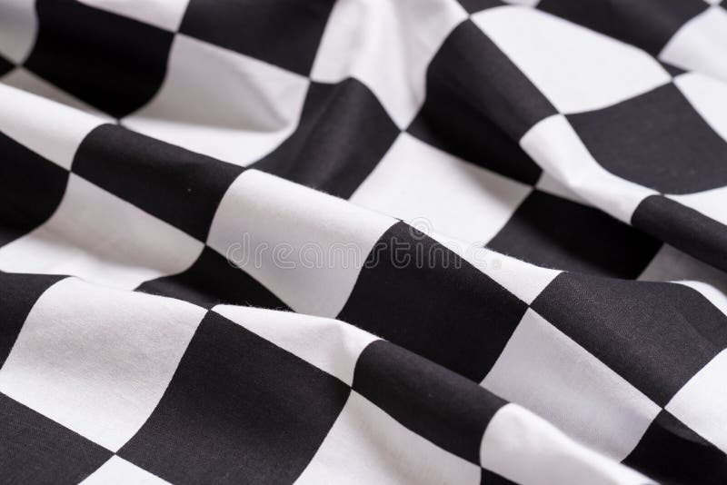 Een geruite vlagachtergrond - motor die rennen - symbool voor het winnen stock foto's Een geruite vlagachtergrond - motor die rennen - symbool voor het winnen stock foto's