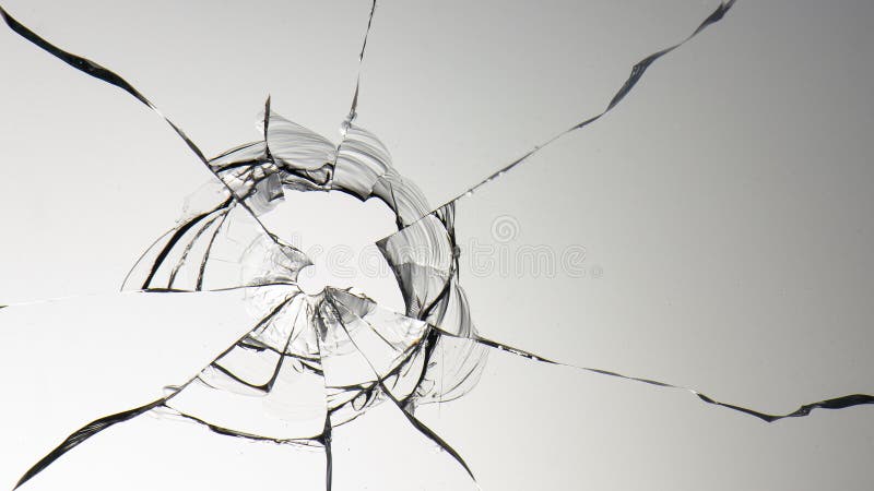 een glazen scheurgat van een kogel op een witte achtergrond stock afbeeldingen een glazen scheurgat van een kogel op een witte achtergrond stock afbeeldingen