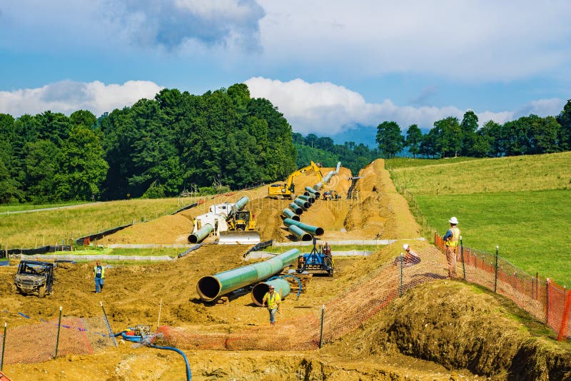 Roanoke County, Virginia USA – July 26th: Mountain Valley Pipeline MVP cutting under the Blue Ridge Parkway at Bent Mountain, Virginia, USA on July 26th, 2018. Roanoke County, Virginia USA – July 26th: Mountain Valley Pipeline MVP cutting under the Blue Ridge Parkway at Bent Mountain, Virginia, USA on July 26th, 2018.