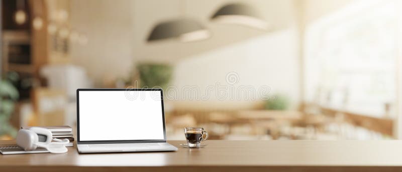 A wooden table features a white-screen laptop computer mockup, headphones, and a coffee cup in a modern Scandinavian coffee shop. 3d render, 3d illustration. A wooden table features a white-screen laptop computer mockup, headphones, and a coffee cup in a modern Scandinavian coffee shop. 3d render, 3d illustration