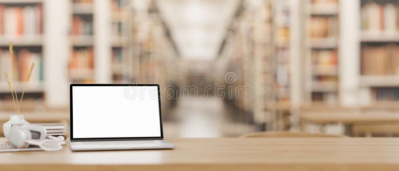 A wooden table features a white-screen laptop computer mockup, headphones, and books in a spacious library. education concept. 3d render, 3d illustration. A wooden table features a white-screen laptop computer mockup, headphones, and books in a spacious library. education concept. 3d render, 3d illustration