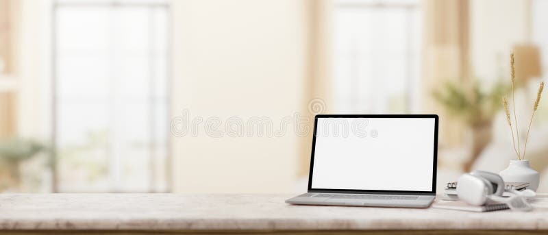 A close-up image of a marble desk with a white-screen laptop computer mockup, headphones, and decor, set against the blurred background of a modern home office. 3d render, 3d illustration. A close-up image of a marble desk with a white-screen laptop computer mockup, headphones, and decor, set against the blurred background of a modern home office. 3d render, 3d illustration