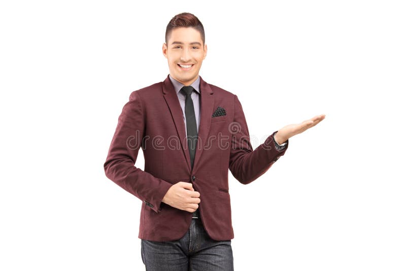 Een modieus glimlachend mannetje die met hallo hand gesturing royalty-vrije stock foto Een modieus glimlachend mannetje die met hallo hand gesturing royalty-vrije stock foto